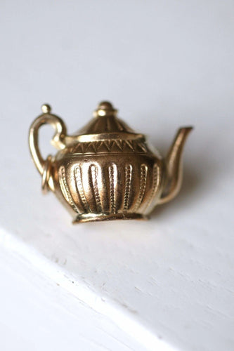 Pendentif Pendentif vintage théière en or jaune 58 Facettes
