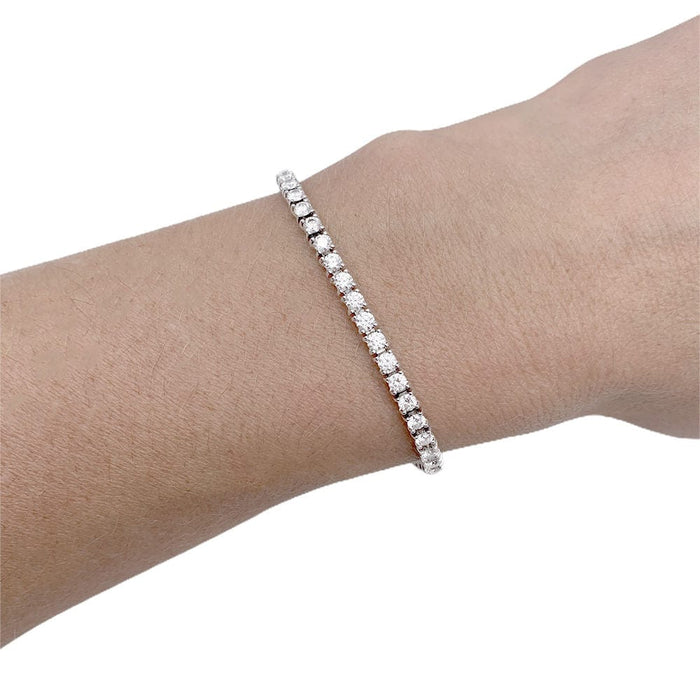 Bracelet Bracelet Cartier, Lignes Essentielles, or blanc, diamants. 58 Facettes 32426
