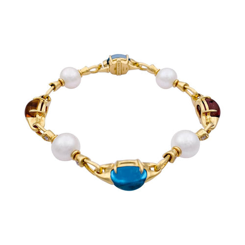 Bracelet Bracelet Bulgari en or jaune, perles, pierres de couleur. 58 Facettes 33083
