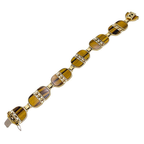 Bracelet Bracelet vintage, or jaune, oeil de tigre. 58 Facettes 32318