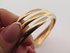 Bracelet bracelet 3 anneaux en or jaune blanc et rose 18k 23 cm trinity 58 Facettes 257839