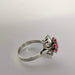 Ring 52 Floral motif ring in white gold Diamond and ruby 58 Facettes 5592