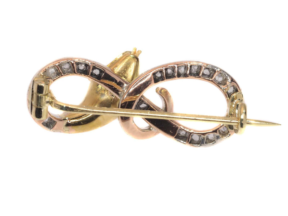 Broche Broche serpent en or, diamants 58 Facettes 19196-0143