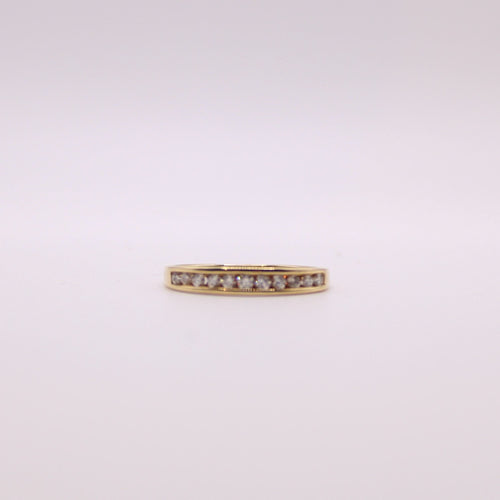 Bague Alliance demi-tour or jaune et diamants serti rail 58 Facettes