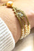 Bracelet Bracelet signed Alessio Boschi, gold, pearls and yellow diamonds 58 Facettes