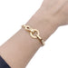 Cartier “Agrafe” bracelet in yellow gold. 58 Facettes 33477