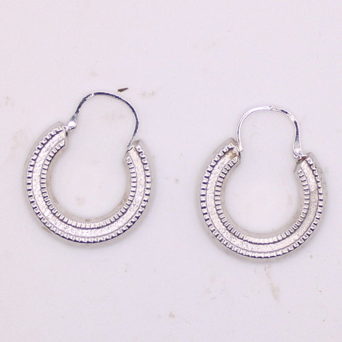 Boucles d'oreilles Créoles en or blanc 58 Facettes