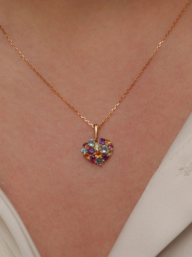 Pendentif Pendentif vintage cœur or pavé de pierres fines 58 Facettes 927