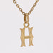 Yellow gold letter H charm pendant 58 Facettes CVP97