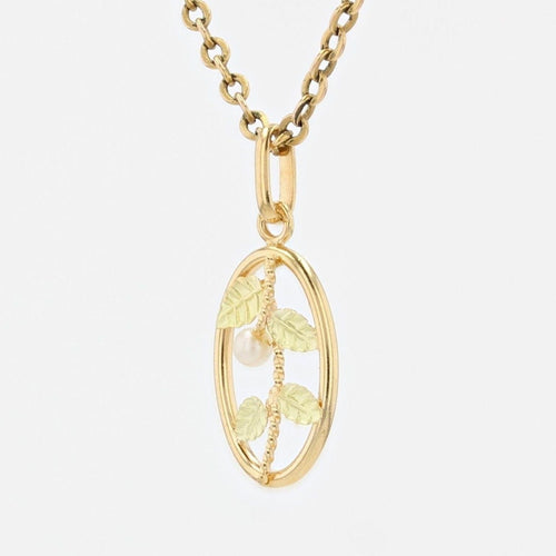 Pendentif Pendentif or jaune perle et feuilles or vert 58 Facettes 19-455I