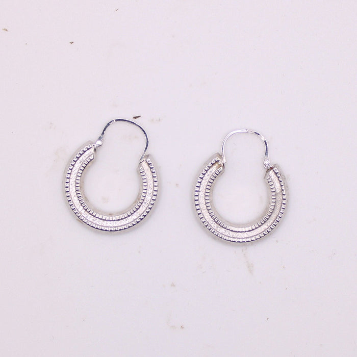 Boucles d'oreilles Créoles en or blanc 58 Facettes