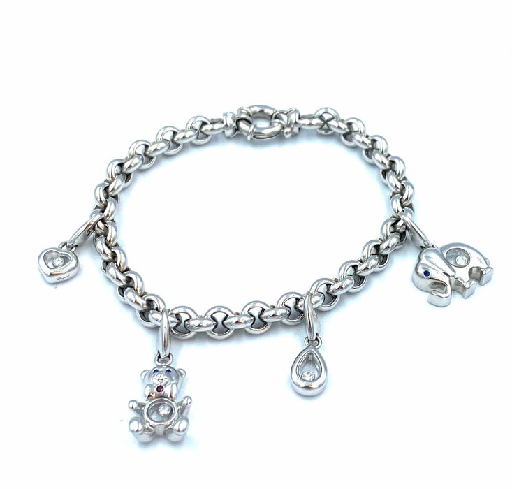 Bracelet CHOPARD. Collection Happy Diamonds, bracelet or blanc et breloques 58 Facettes