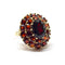 Bague Bague ancienne fleur grenats or jaune 58 Facettes