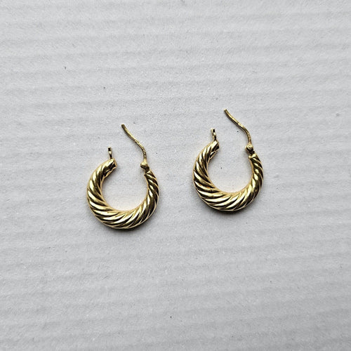 Boucles d'oreilles Boucles d’oreilles créoles torsadées Or jaune 58 Facettes