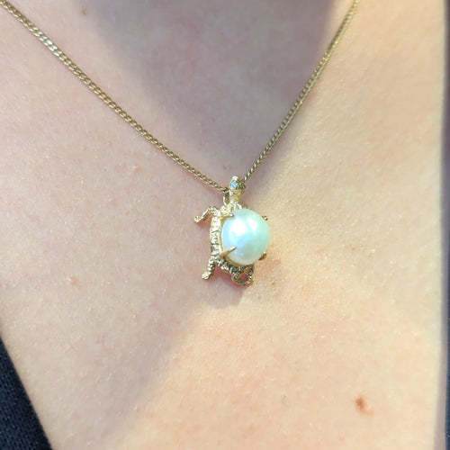 Pendentif Pendentif Animalier or jaune et perle 58 Facettes 27217