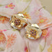 Earrings Clip-on earrings retro flowers ruby ​​diamonds 58 Facettes 22-544A
