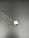 VAN CLEEF & ARPELS pendant. Vintage Alhambra collection, yellow gold and mother-of-pearl pendant 58 Facettes