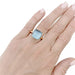 Ring 56 Pomellato ring, “Nudo Maxi”, two golds and blue topaz. 58 Facettes 32845