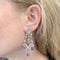 Boucles d'oreilles Boucles d'oreilles Chopard "Copacabana" en or blanc, diamants, saphirs. 58 Facettes 31568