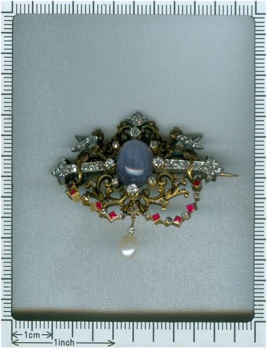 Broche Broche avec deux sphinges diamant, saphir 58 Facettes 18052-0023
