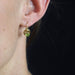 Dormeuses earrings in yellow gold and peridots 58 Facettes 15-116