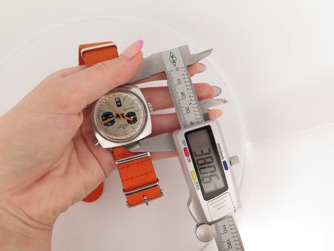 Montre vintage montre BREITLING top time 2211-15 38 mm automatique acier 58 Facettes 251742