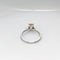 Bague Solitaire en or blanc diamants et saphir jaune 58 Facettes 21260