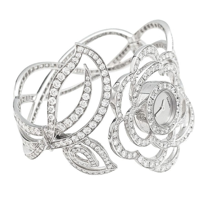 Montre Montre Chanel "Fil de Camélia" en or blanc et diamants. 58 Facettes 31123