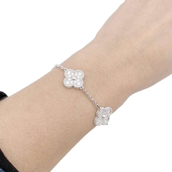 Bracelet Bracelet Van Cleef & Arpels, "Vintage Alhambra", or blanc, diamants. 58 Facettes 33552