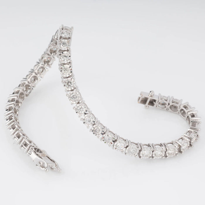 Bracelet Bracelet rivière et or gris orné de diamant 58 Facettes 1