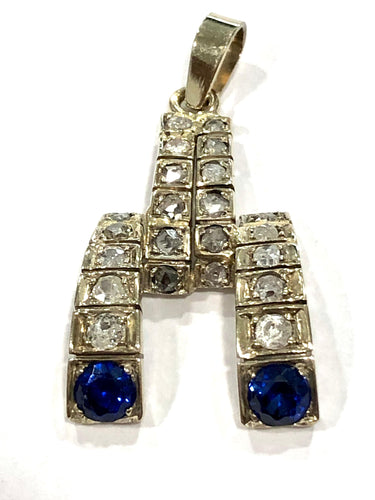 Pendentif Pendentif en or blanc, diamants et spinelles 58 Facettes