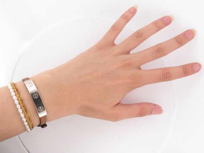 Bracelet bracelet CARTIER love cuir et barrette or blanc 18k 15-19.5 58 Facettes 252399