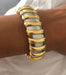 Bracelet Gold and steel bracelet from Bvlgari 58 Facettes 1