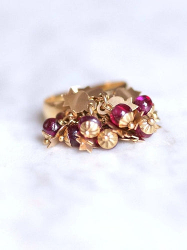 Bague Bague de cocktail vintage en or jaune et pampilles de rubis 58 Facettes