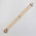 Bracelet 3 row pearl bracelet and flower clasp 58 Facettes 22-469
