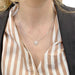 Necklace Tiffany & Co. necklace, "Victoria, flower corolla pendant", platinum, diamonds. 58 Facettes 32130