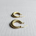 Earrings Twisted hoop earrings Yellow gold 58 Facettes