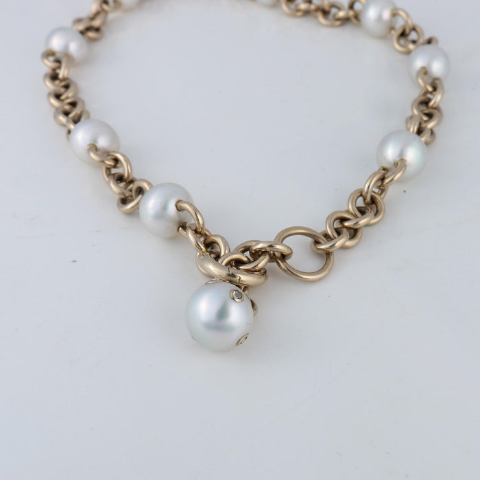 Collier Collier en or gris avec huit perles 58 Facettes
