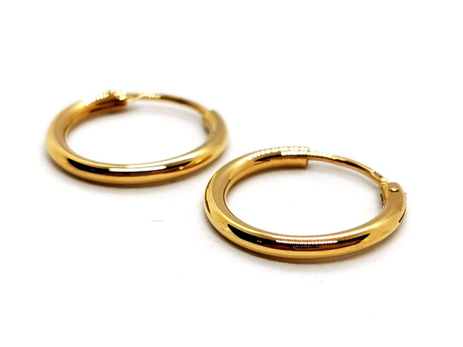 Boucles d'oreilles Boucles d'oreilles Créoles Or jaune 58 Facettes 1167342CN