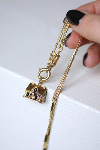 Pendentif Pendentif charm vintage maison en or 58 Facettes