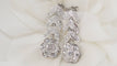 Boucles d'oreilles Pendantes en or blanc, diamants 58 Facettes 32070