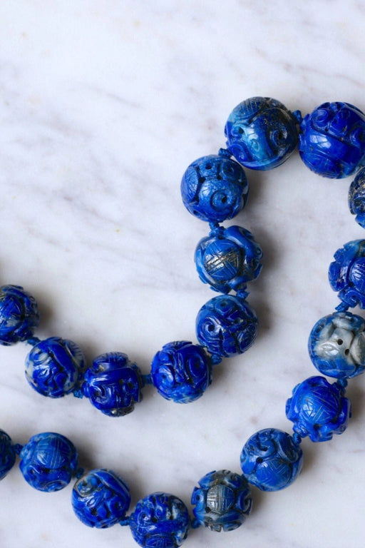 Collier Collier perles de lapis lazuli sculptées 58 Facettes