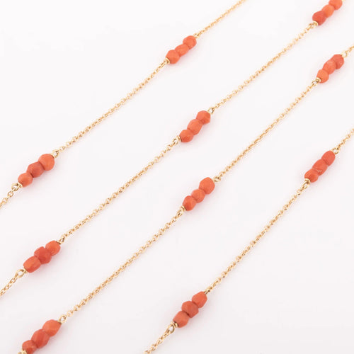 Collier Sautoir en or jaune et  boules de corail facettés 58 Facettes