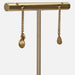 Earrings Gold petal dangling earrings 58 Facettes 19-071
