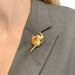Brooch “Crowned Bird” brooch in yellow gold, emerald, enamel. 58 Facettes 31613