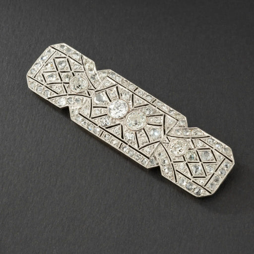 Broche Broche Art-Déco en Or gris, Platine & Diamants 58 Facettes