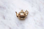 Pendentif Pendentif vintage théière en or jaune 58 Facettes