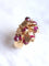 Bague Bague de cocktail vintage en or jaune et pampilles de rubis 58 Facettes