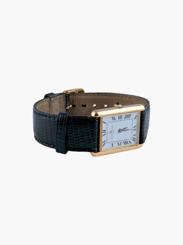 Montre Montre Baume & Mercier, Modèle Tank, Remontoir Saphir, Or jaune 58 Facettes