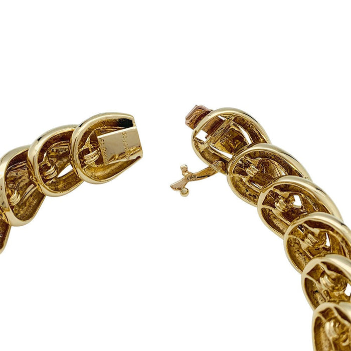 Bracelet Barcelet Boucheron "Tressé" en or jaune. 58 Facettes 31259